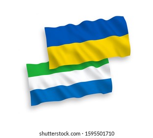 National vector fabric wave flags of Sierra Leone and Ukraine isolated on white background. 1 to 2 proportion.