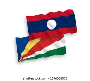 National vector fabric wave flags of Seychelles and Laos isolated on white background. 1 to 2 proportion.