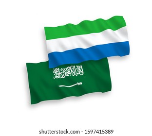 National vector fabric wave flags of Saudi Arabia and Sierra Leone isolated on white background. 1 to 2 proportion.