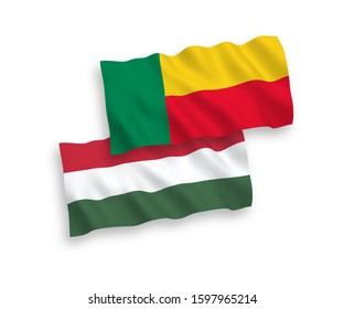 National vector fabric wave flags of Benin and Hungary isolated on white background. 1 to 2 proportion.