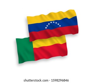 National vector fabric wave flags of Benin and Spain isolated on white background. 1 to 2 proportion.