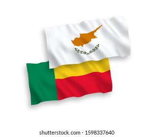 National vector fabric wave flags of Cyprus and Benin isolated on white background. 1 to 2 proportion.