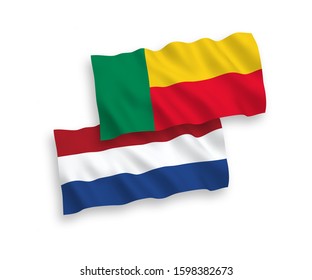 National vector fabric wave flags of Benin and Netherlands isolated on white background. 1 to 2 proportion.