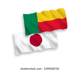 National vector fabric wave flags of Japan and Benin isolated on white background. 1 to 2 proportion.