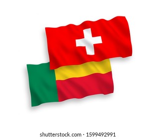National vector fabric wave flags of Benin and Switzerland isolated on white background. 1 to 2 proportion.