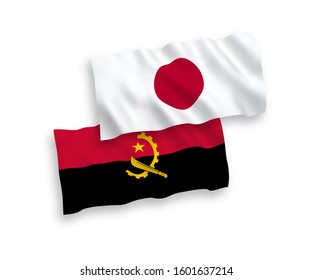 National vector fabric wave flags of Japan and Angola isolated on white background. 1 to 2 proportion.