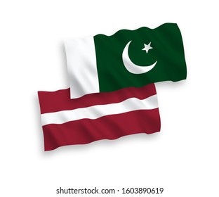 National vector fabric wave flags of Latvia and Pakistan isolated on white background. 1 to 2 proportion.