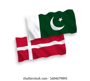 National vector fabric wave flags of Denmark and Pakistan isolated on white background. 