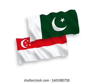 National vector fabric wave flags of Pakistan and Singapore isolated on white background. 1 to 2 proportion.