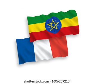 National vector fabric wave flags of France and Ethiopia isolated on white background. 1 to 2 proportion.