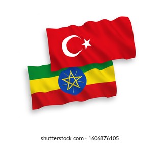 National vector fabric wave flags of Turkey and Ethiopia isolated on white background. 1 to 2 proportion.