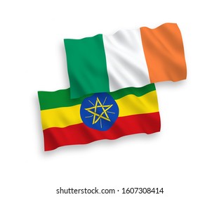 National vector fabric wave flags of Ireland and Ethiopia isolated on white background. 1 to 2 proportion.