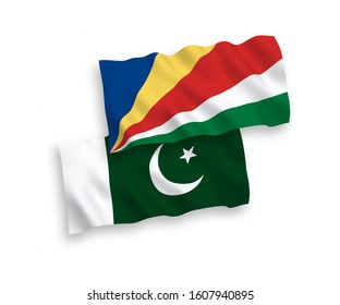 National vector fabric wave flags of Pakistan and Seychelles isolated on white background. 1 to 2 proportion.
