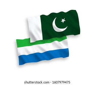 National vector fabric wave flags of Pakistan and Sierra Leone isolated on white background. 1 to 2 proportion.