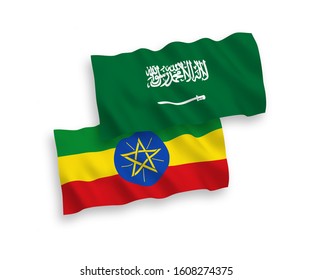 National vector fabric wave flags of Saudi Arabia and Ethiopia isolated on white background. 1 to 2 proportion.