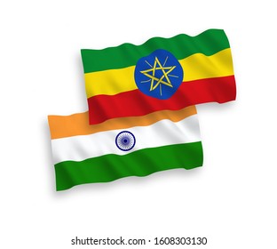 National vector fabric wave flags of India and Ethiopia isolated on white background. 1 to 2 proportion.