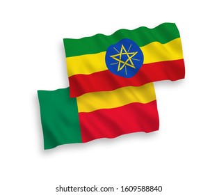 National vector fabric wave flags of Ethiopia and Benin isolated on white background. 1 to 2 proportion.