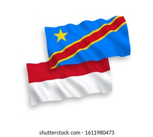 National vector fabric wave flags of Indonesia and Democratic Republic of the Congo isolated on white background. 1 to 2 proportion.