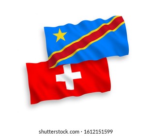 National vector fabric wave flags of Democratic Republic of the Congo and Switzerland isolated on white background. 1 to 2 proportion.