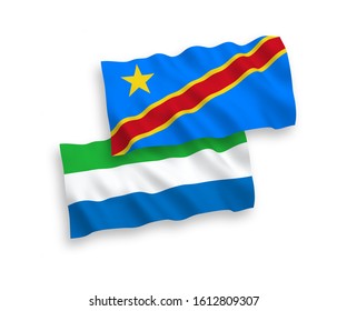 National vector fabric wave flags of Democratic Republic of the Congo and Sierra Leone isolated on white background. 1 to 2 proportion.