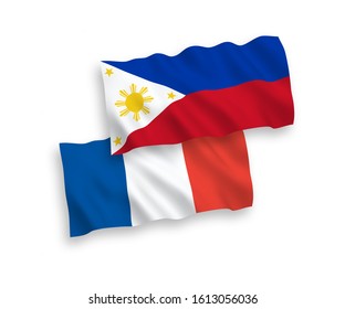 National vector fabric wave flags of France and Philippines isolated on white background. 1 to 2 proportion.