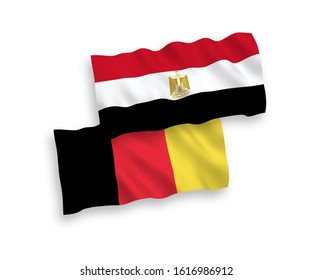 National vector fabric wave flags of Egypt and Belgium isolated on white background. 1 to 2 proportion.