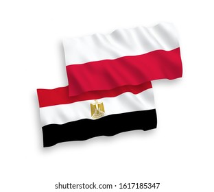 National vector fabric wave flags of Egypt and Poland isolated on white background. 1 to 2 proportion.