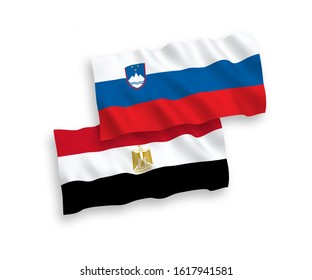 National vector fabric wave flags of Slovenia and Egypt isolated on white background. 1 to 2 proportion.