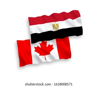 National vector fabric wave flags of Canada and Egypt isolated on white background. 1 to 2 proportion.