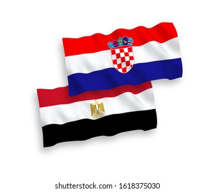 National vector fabric wave flags of Egypt and Croatia isolated on white background. 1 to 2 proportion.