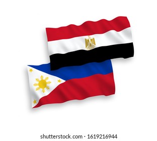 National vector fabric wave flags of Egypt and Philippines isolated on white background. 1 to 2 proportion.