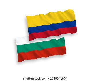 National vector fabric wave flags of Bulgaria and Colombia isolated on white background. 1 to 2 proportion.