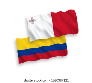 National vector fabric wave flags of Malta and Colombia isolated on white background. 1 to 2 proportion.