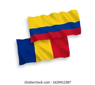 National vector fabric wave flags of Romania and Colombia isolated on white background. 1 to 2 proportion.