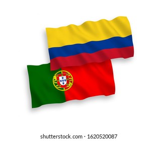 National vector fabric wave flags of Portugal and Colombia isolated on white background. 1 to 2 proportion.