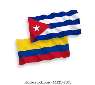 National vector fabric wave flags of Colombia and Cuba isolated on white background. 1 to 2 proportion.