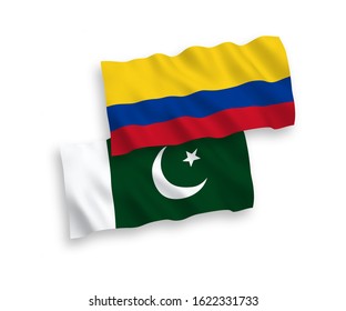 National vector fabric wave flags of Colombia and Pakistan isolated on white background. 1 to 2 proportion.