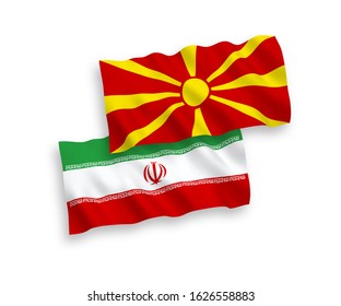 National vector fabric wave flags of Iran and North Macedonia isolated on white background. 1 to 2 proportion.