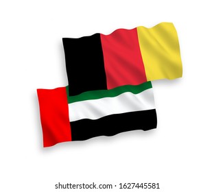 National vector fabric wave flags of United Arab Emirates and Belgium isolated on white background. 1 to 2 proportion.