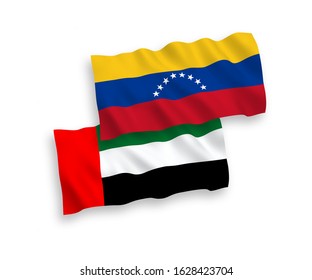 National vector fabric wave flags of Venezuela and United Arab Emirates isolated on white background. 1 to 2 proportion.