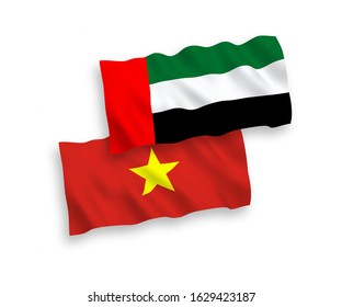 National vector fabric wave flags of United Arab Emirates and Vietnam isolated on white background. 1 to 2 proportion.