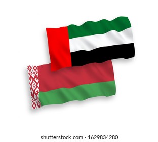 National vector fabric wave flags of United Arab Emirates and Belarus isolated on white background. 1 to 2 proportion.