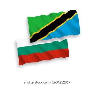 National vector fabric wave flags of Bulgaria and Tanzania isolated on white background. 1 to 2 proportion.