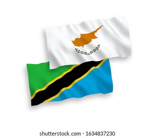 National vector fabric wave flags of Cyprus and Tanzania isolated on white background. 1 to 2 proportion.