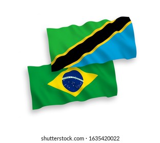 National vector fabric wave flags of Brazil and Tanzania isolated on white background. 1 to 2 proportion.