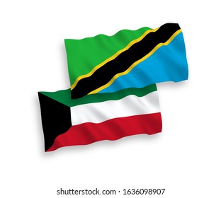 National vector fabric wave flags of Tanzania and Kuwait isolated on white background. 1 to 2 proportion.