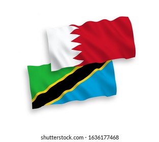 National vector fabric wave flags of Tanzania and Bahrain isolated on white background. 1 to 2 proportion.