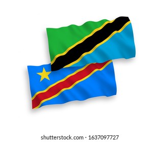National vector fabric wave flags of Tanzania and Democratic Republic of the Congo isolated on white background. 1 to 2 proportion.