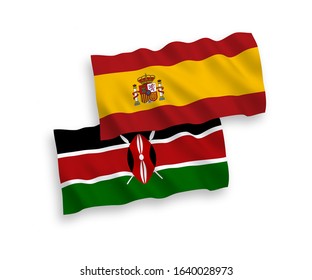 National vector fabric wave flags of Kenya and Spain isolated on white background. 1 to 2 proportion.