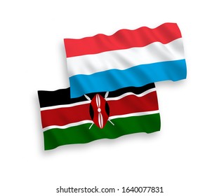 National vector fabric wave flags of Kenya and Luxembourg isolated on white background. 1 to 2 proportion.
